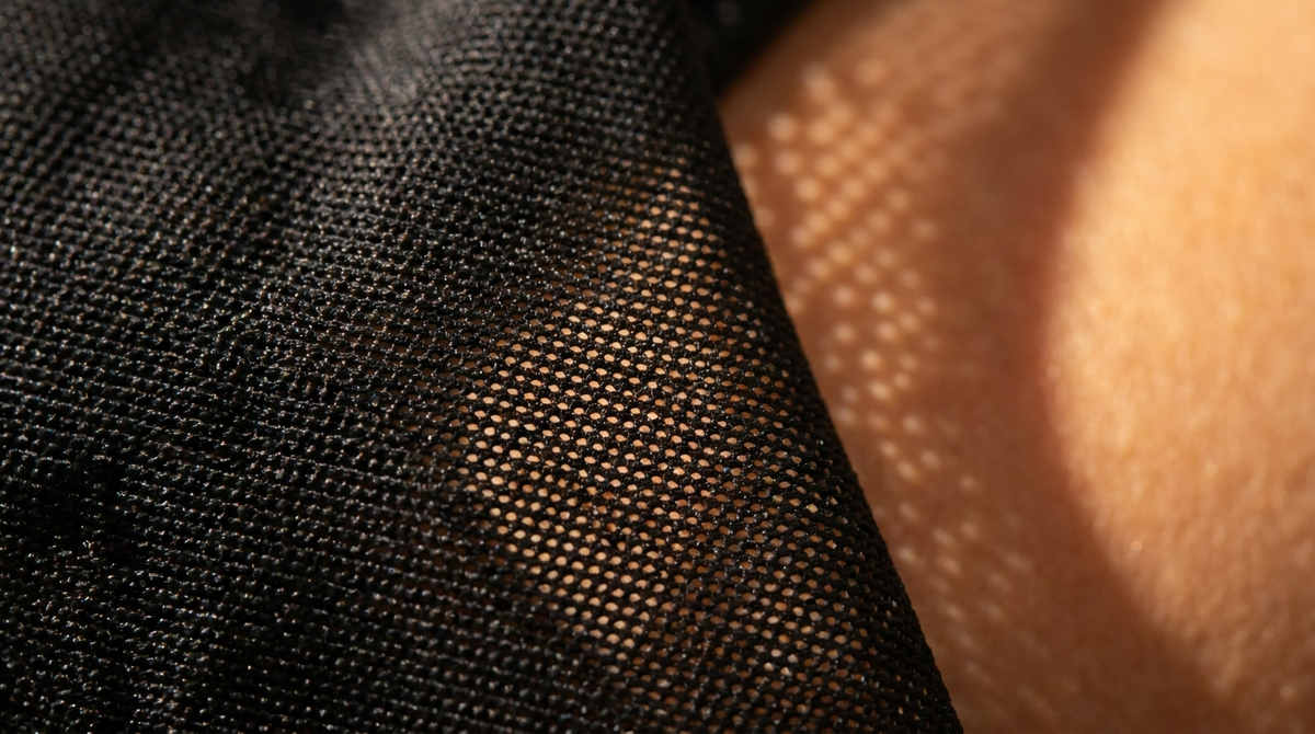 Close-up of tan-through fabric on skin